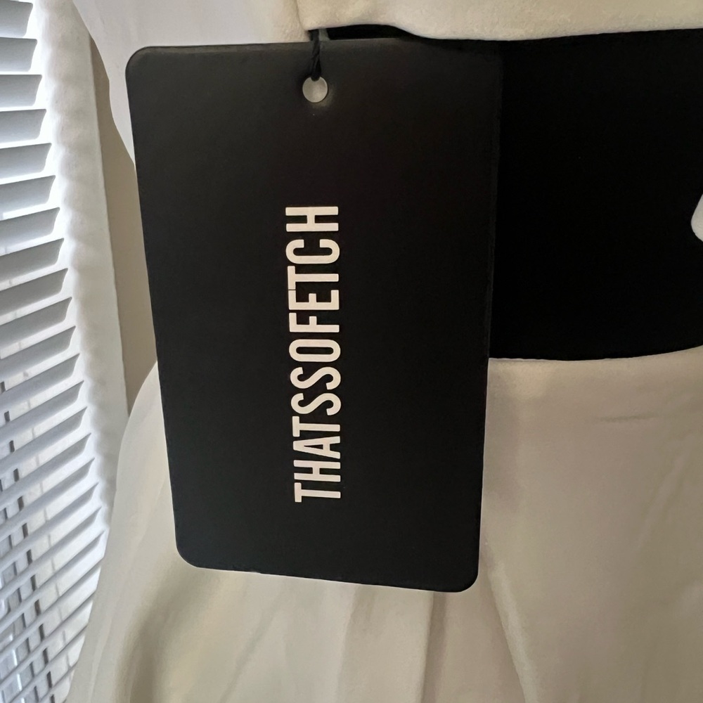 Chic White Sleeveless Mini Dress - Picture 9 of 16